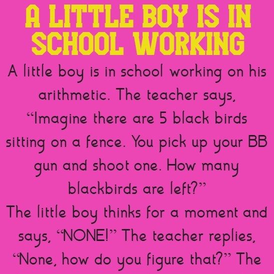 A little boy is in school working