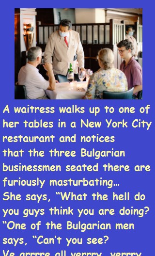 A waitress walks up to one of her tables in a New York City 